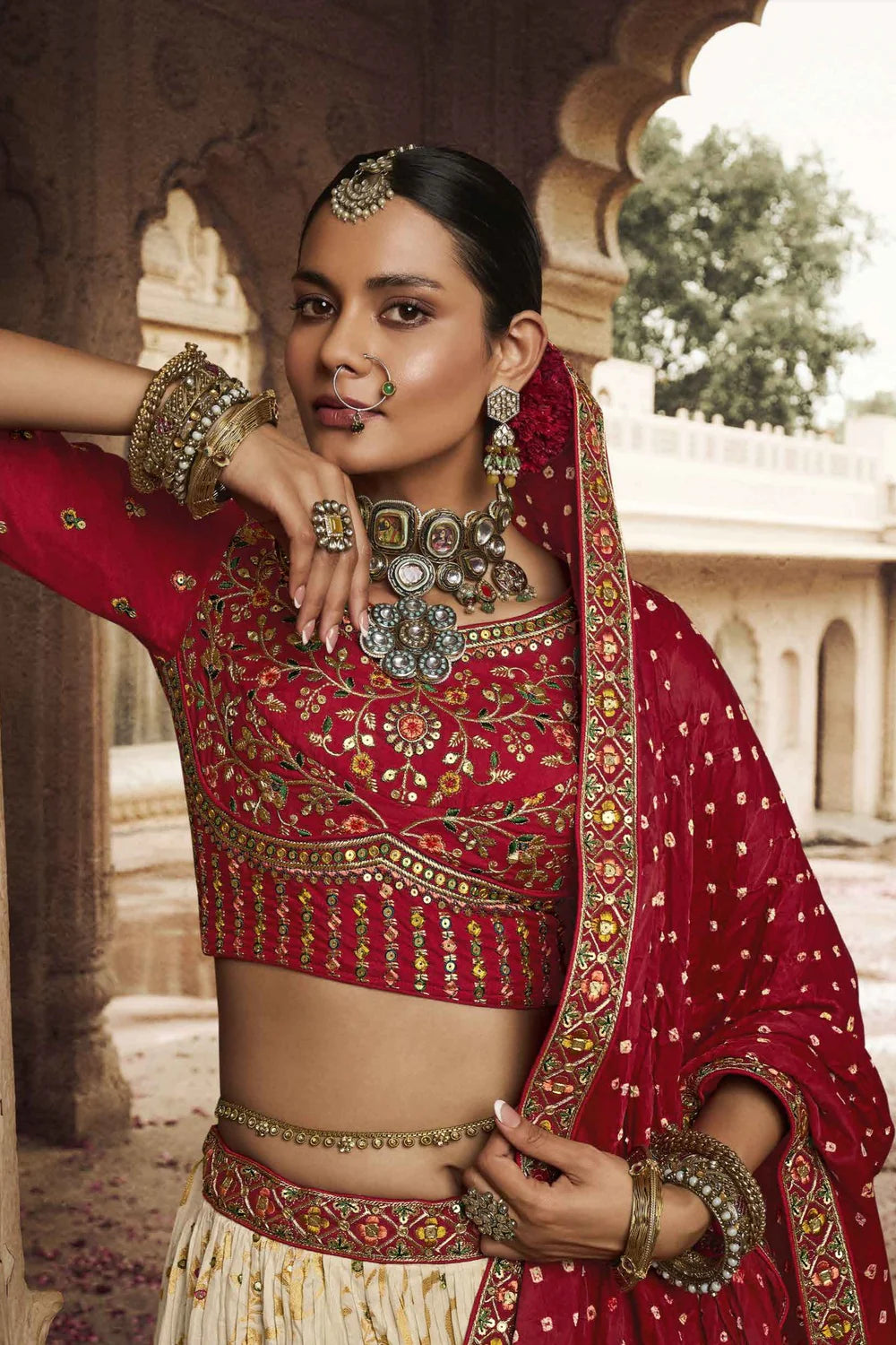 White and Red Silk Heavy Embroidered Bridal Lehenga Choli - Rent