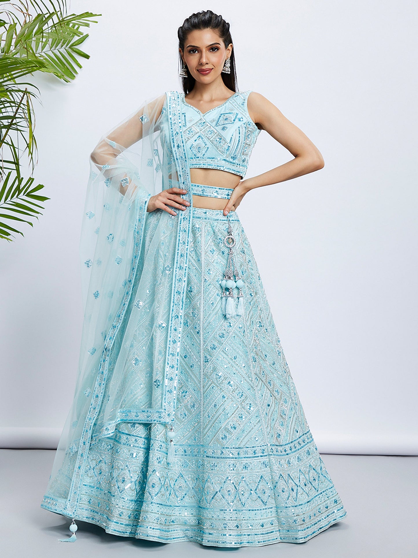 Turquoise blue Net Cutdana, Sequins and Zarkan embroidery Lehenga