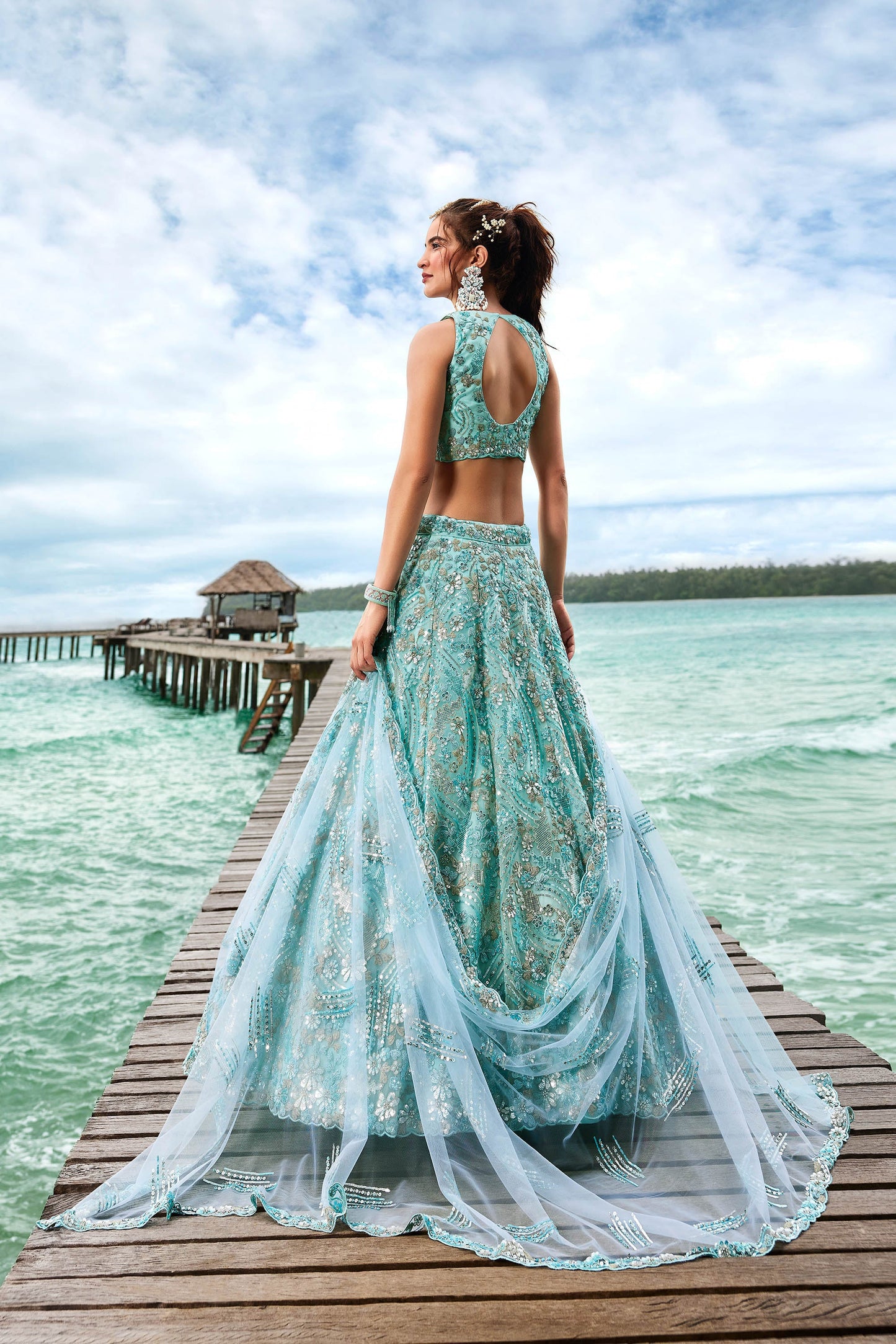 Turquoise Blue Net Sequins and Zarkan embroidery Lehenga
