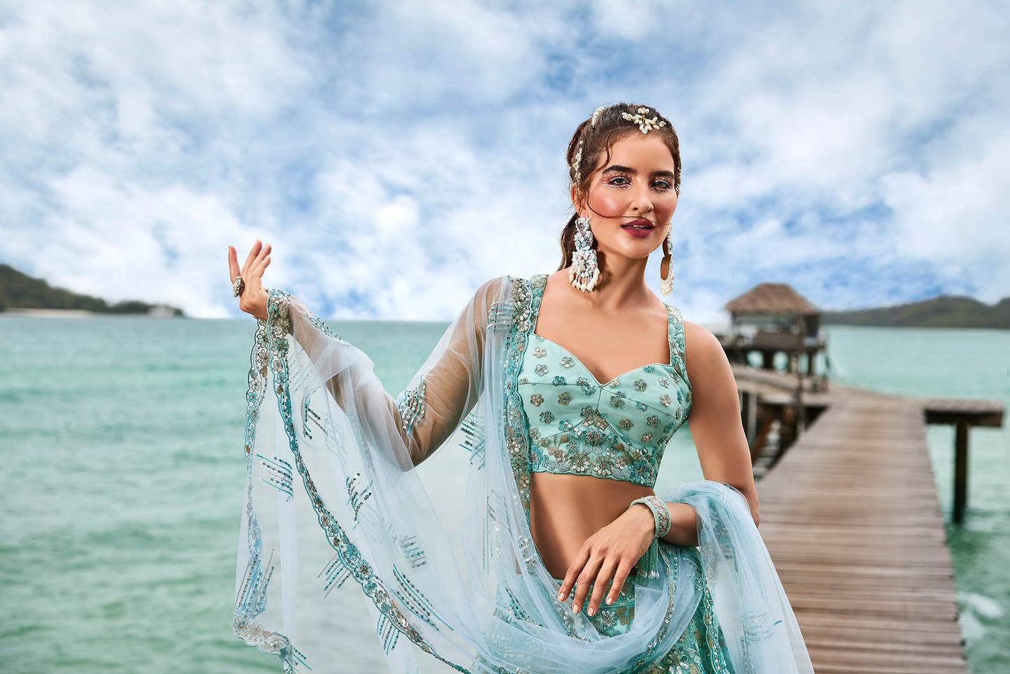 Turquoise Blue Net Sequins and Zarkan embroidery Lehenga