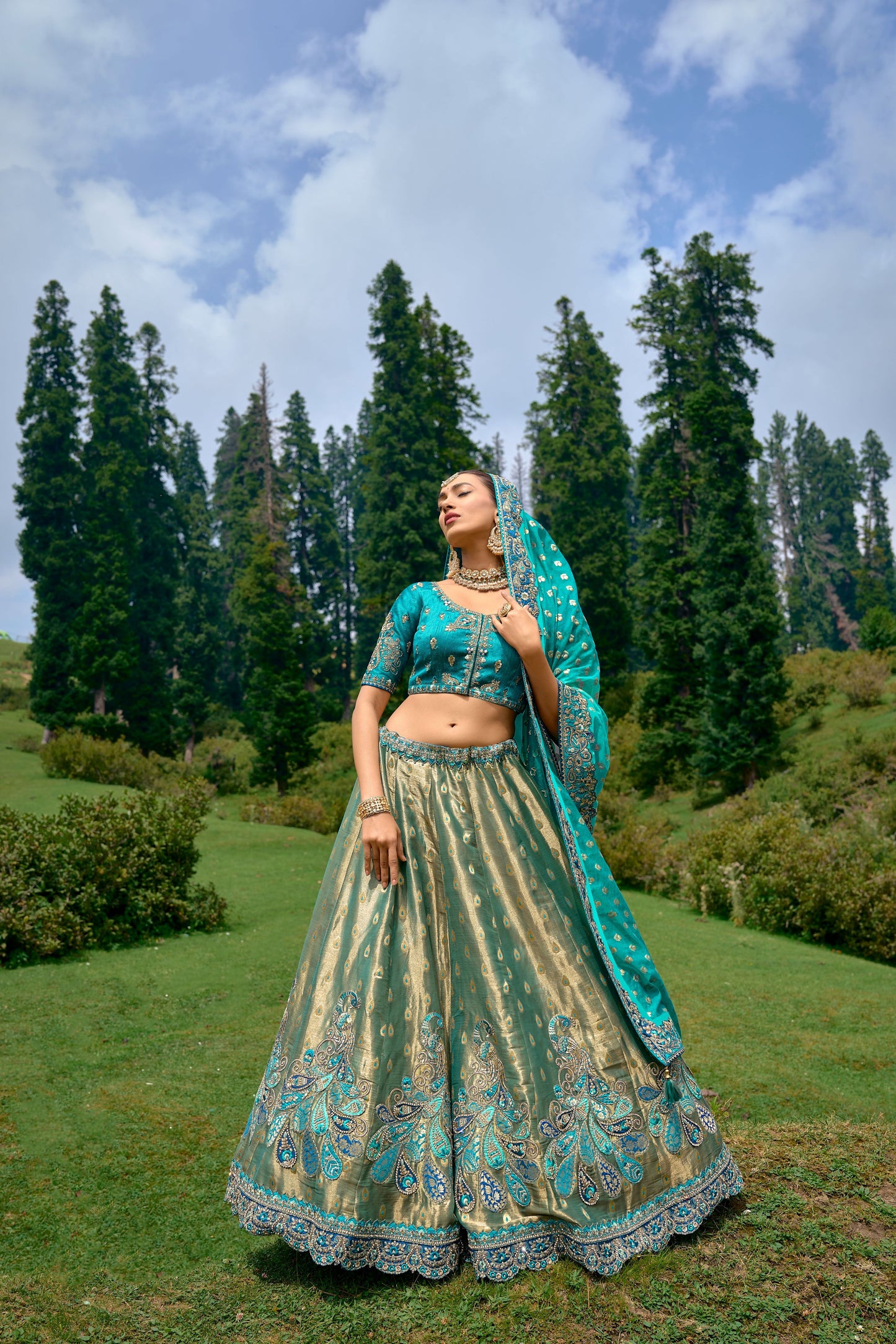 Teal Blue Color Silk Heavy Embroidered Lehenga Choli - Rent