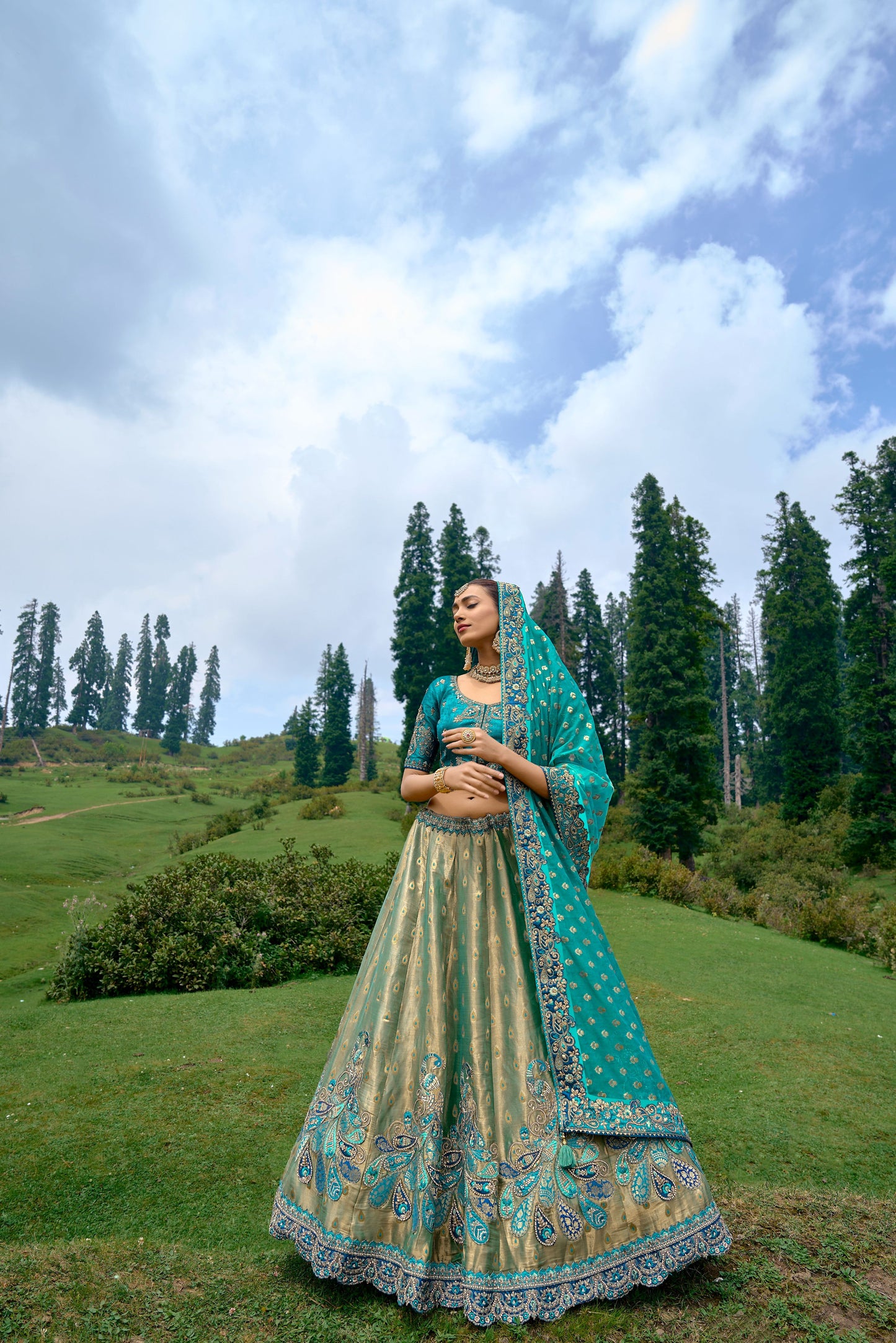 Teal Blue Color Silk Heavy Embroidered Lehenga Choli - Rent