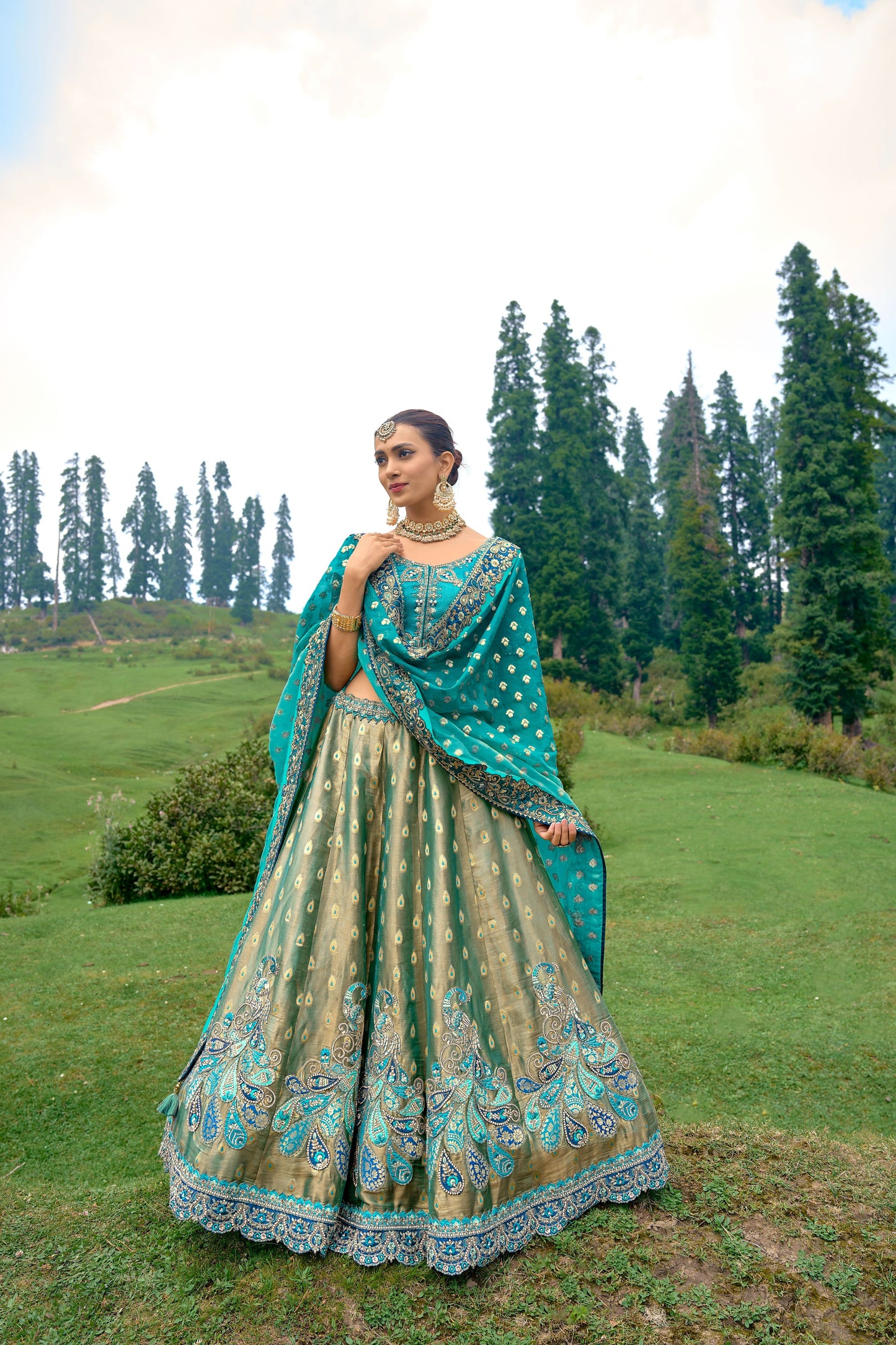 Teal Blue Color Silk Heavy Embroidered Lehenga Choli - Rent