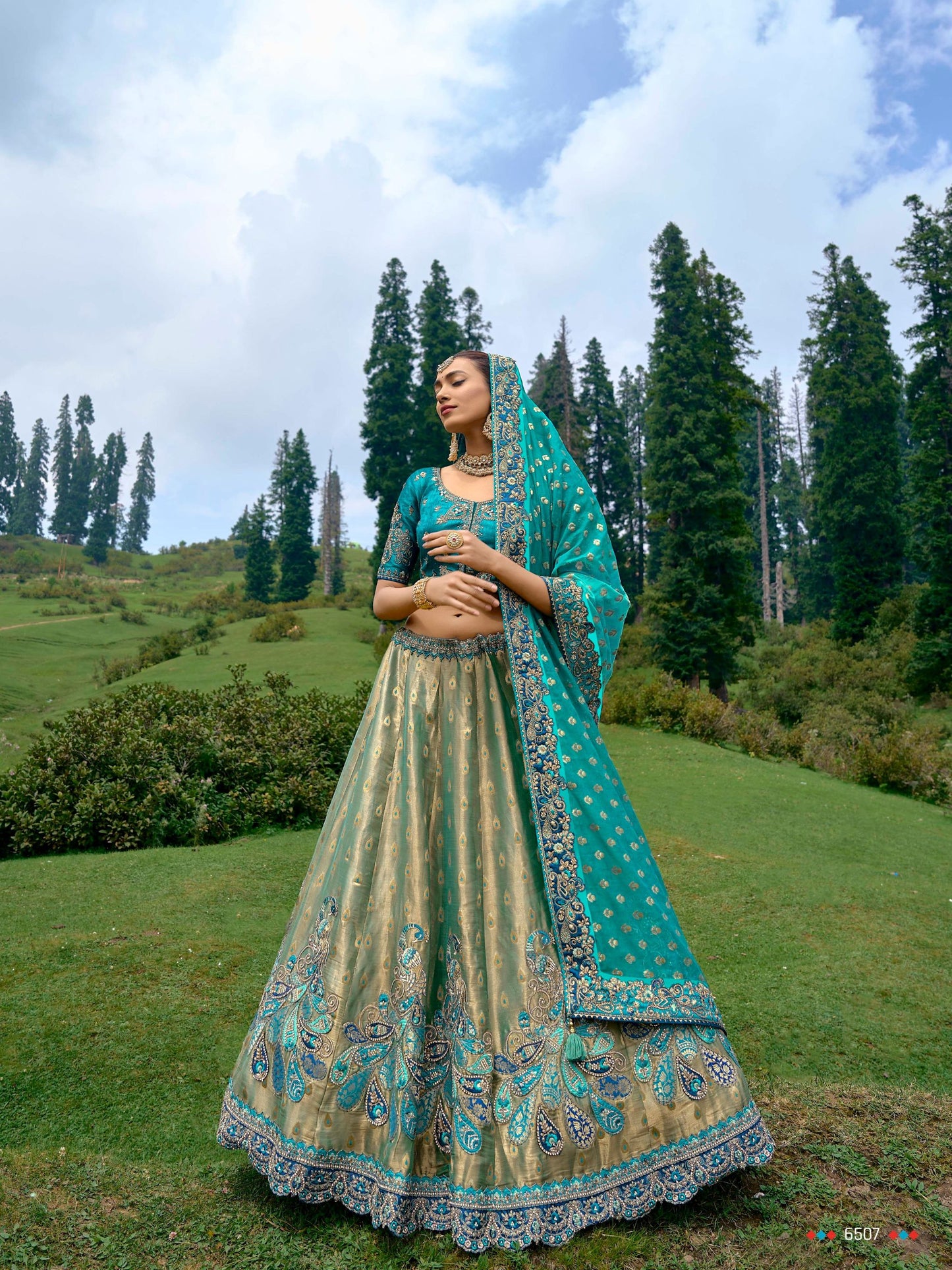 Teal Blue Color Silk Heavy Embroidered Lehenga Choli - Rent