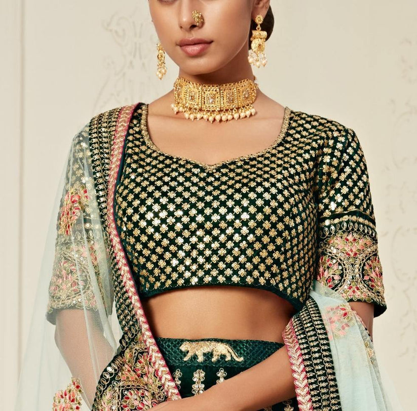 Green Heavy Bridal Wear Lehenga Choli For Rent