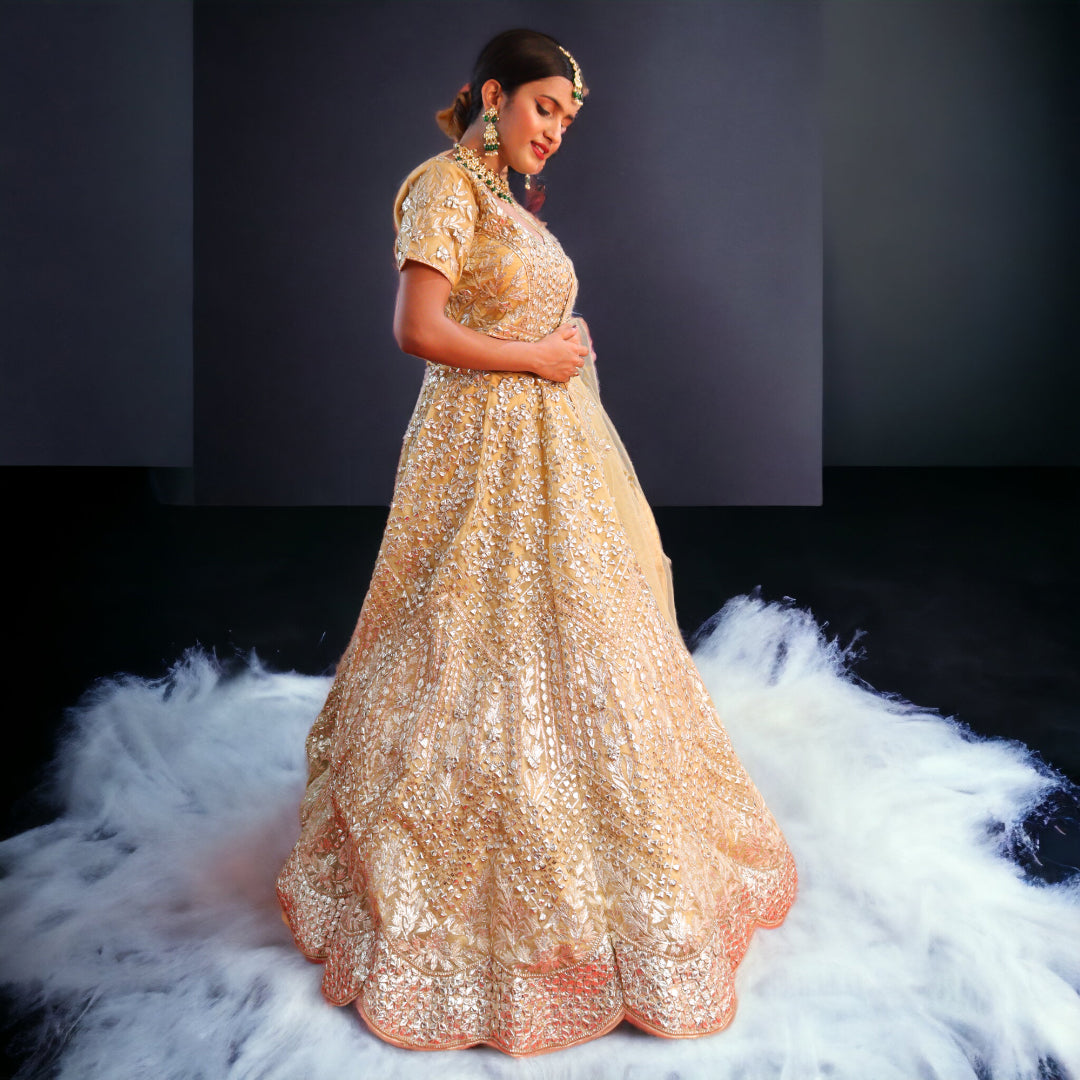 Golden Raw Silk Hand Embroidered Gotapatti Bridal Lehenga