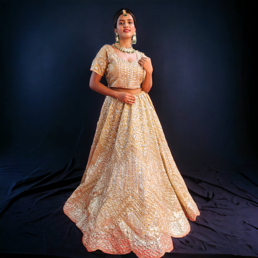 Golden Raw Silk Hand Embroidered Gotapatti Bridal Lehenga