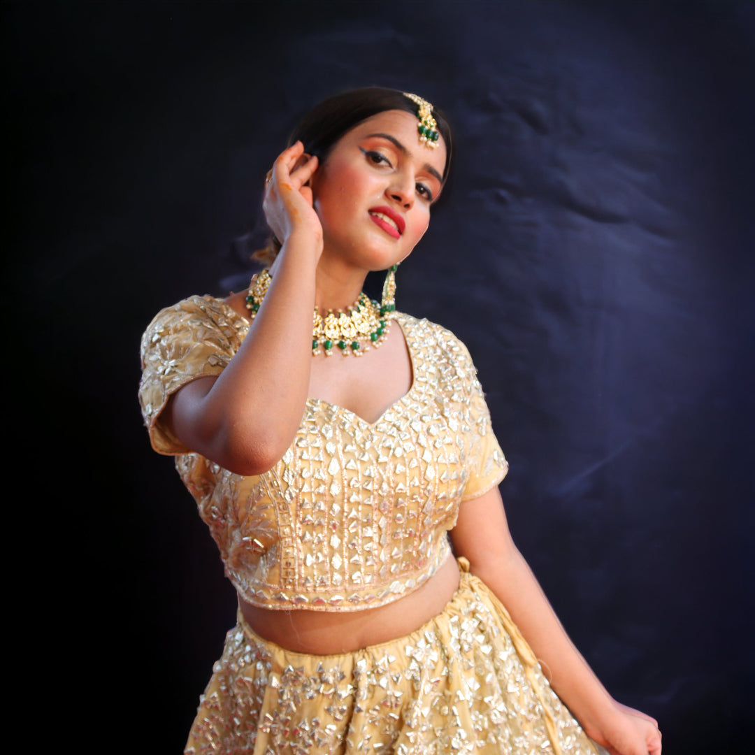 Golden Raw Silk Hand Embroidered Gotapatti Bridal Lehenga