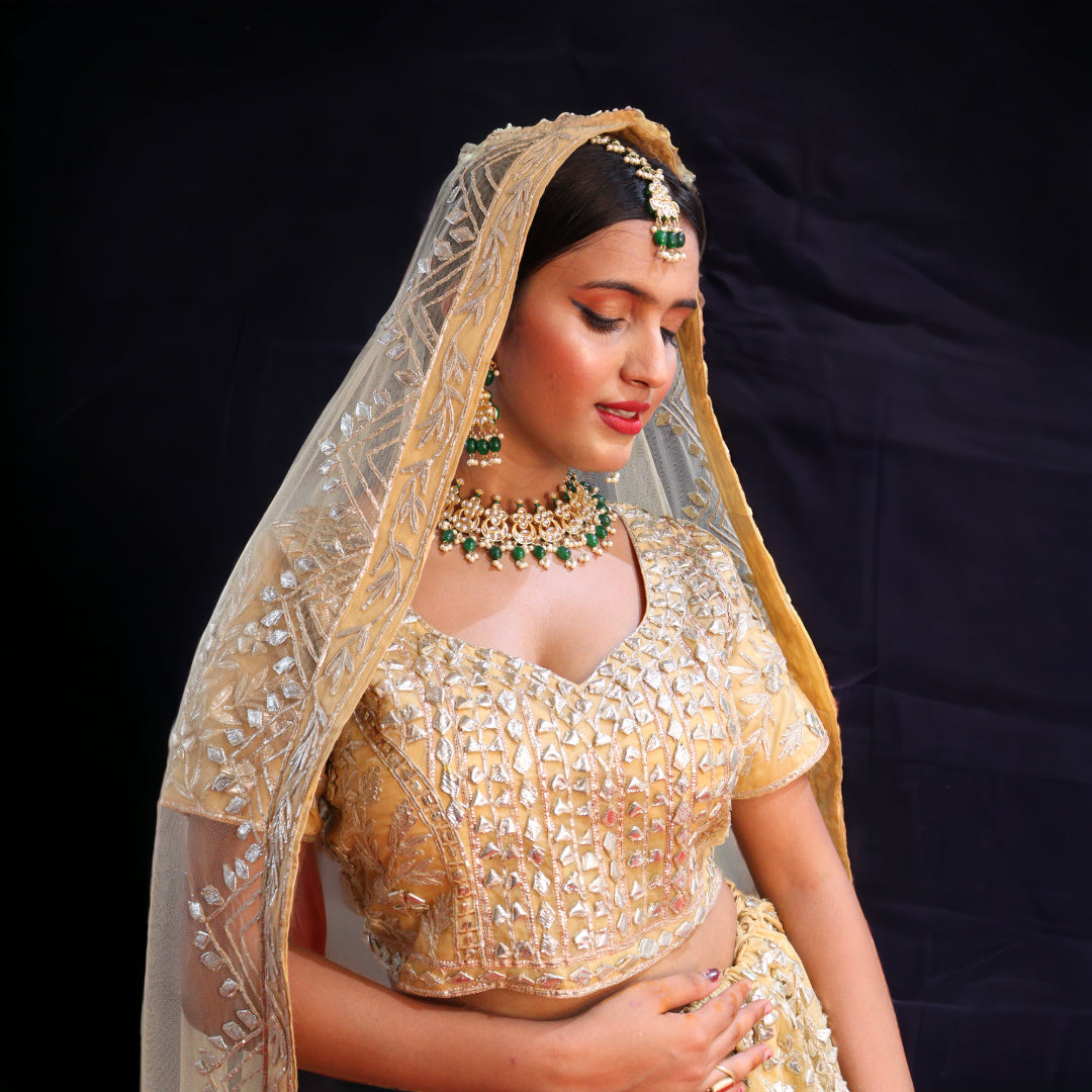 Golden Raw Silk Hand Embroidered Gotapatti Bridal Lehenga