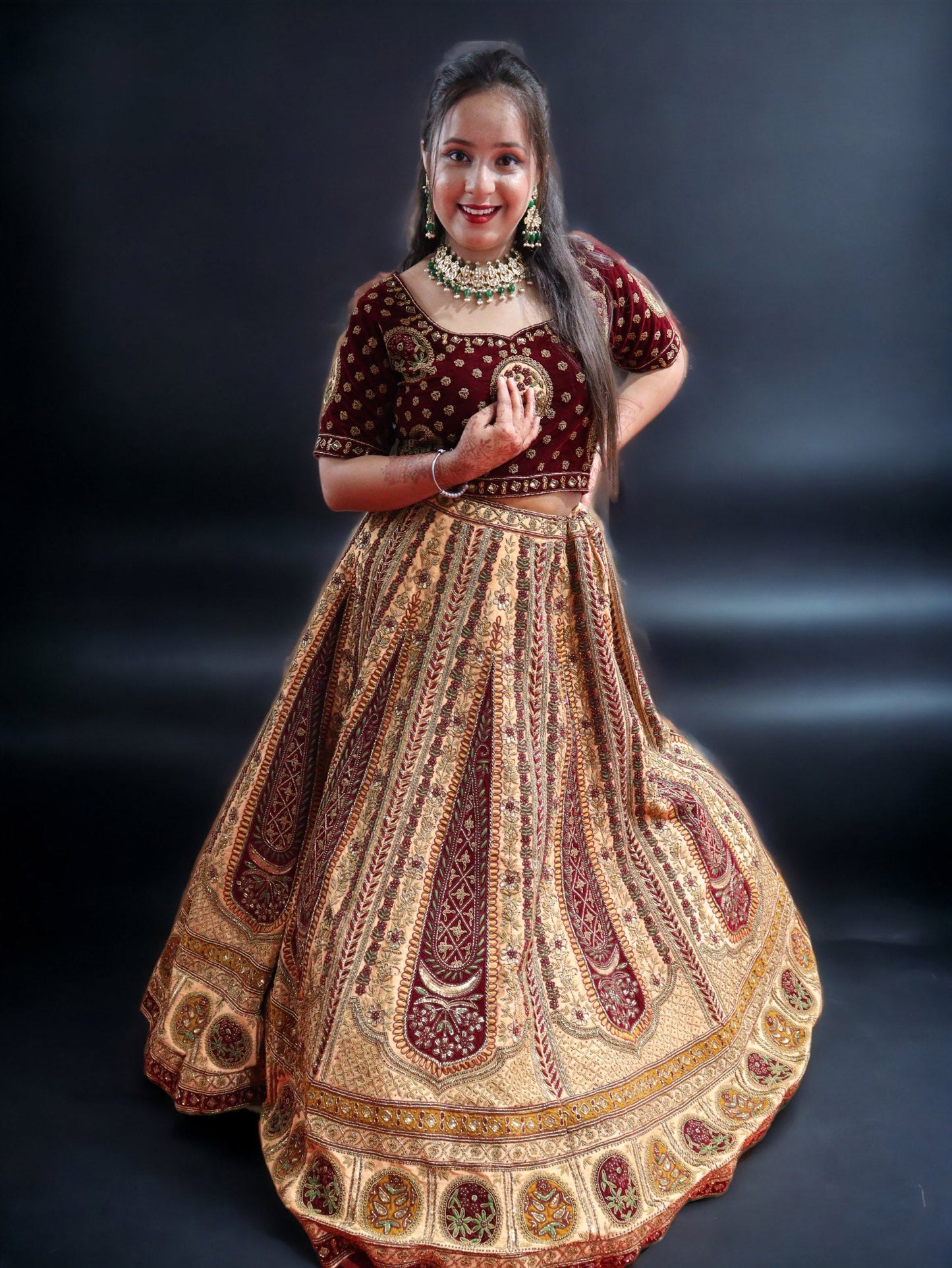 Golden and Maroon Rajwada Raw Silk Hand Embroidered Antique Work Bridal Lehenga