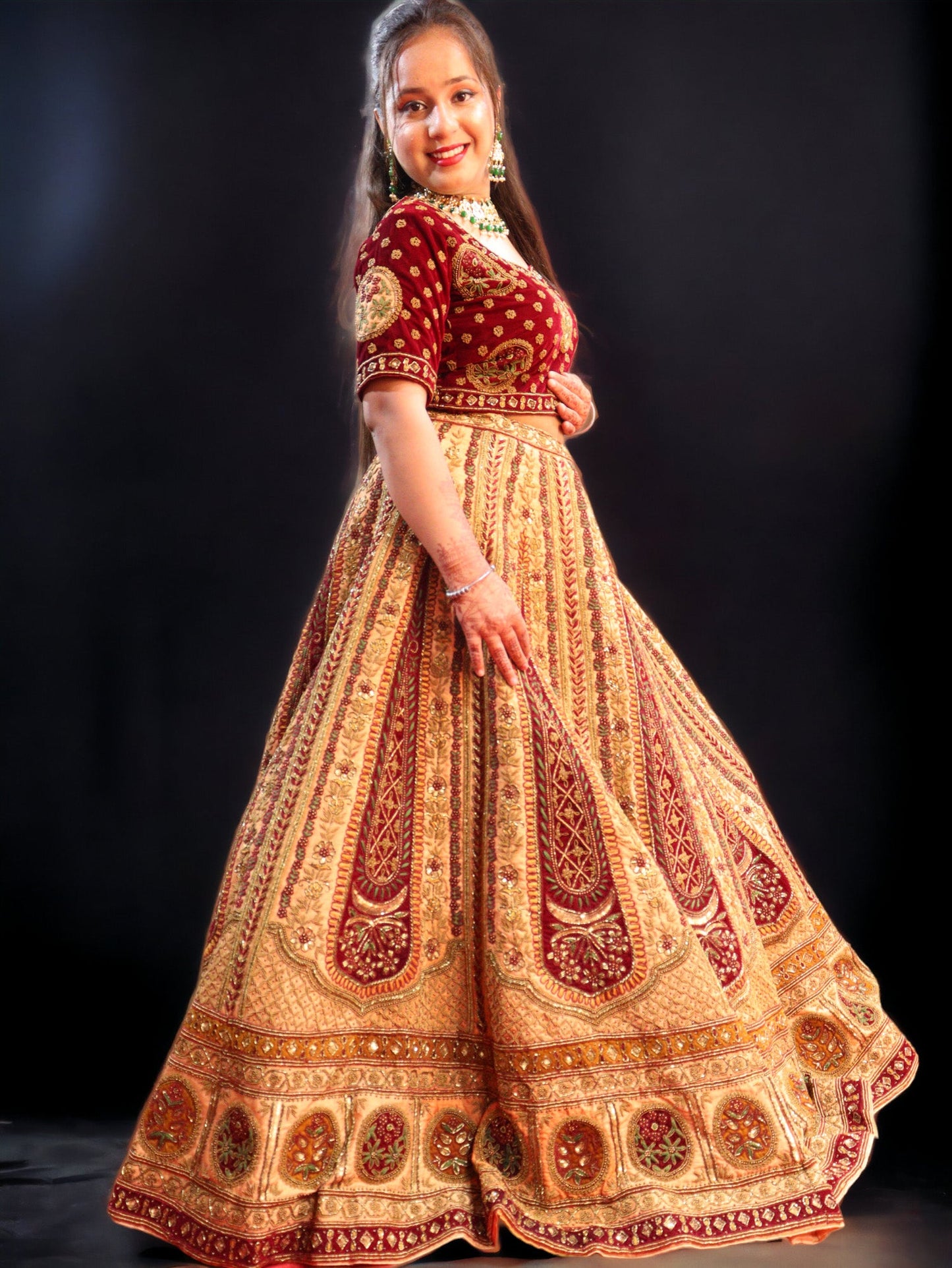 Golden and Maroon Rajwada Raw Silk Hand Embroidered Antique Work Bridal Lehenga