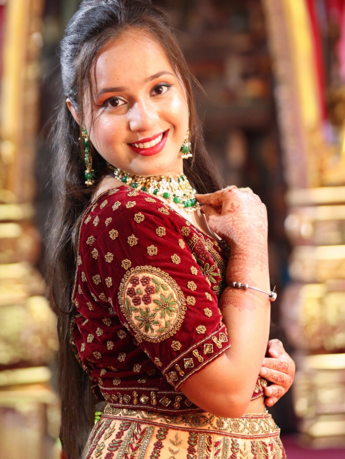 Golden and Maroon Rajwada Raw Silk Hand Embroidered Antique Work Bridal Lehenga
