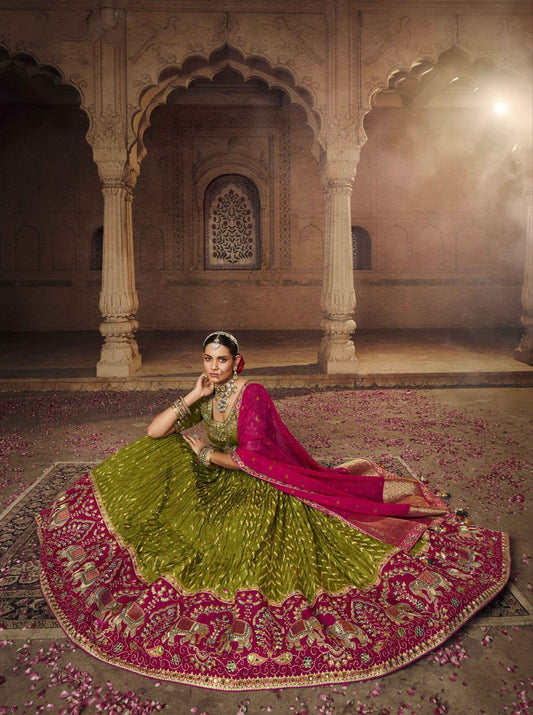 Olive Green and Pink Silk Heavy Embroidered Lehenga Choli - Rent