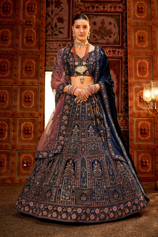 Blue Velvet Hand Embroidered Heavy Bridal Lehenga with Net Dupatta