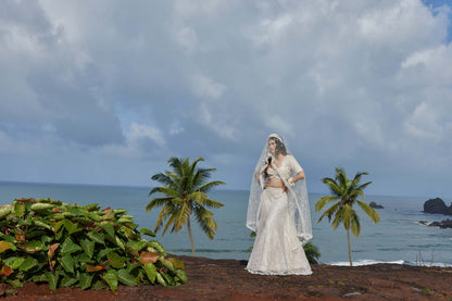 Mahavir Machine Embroidered Net White Reception lehenga