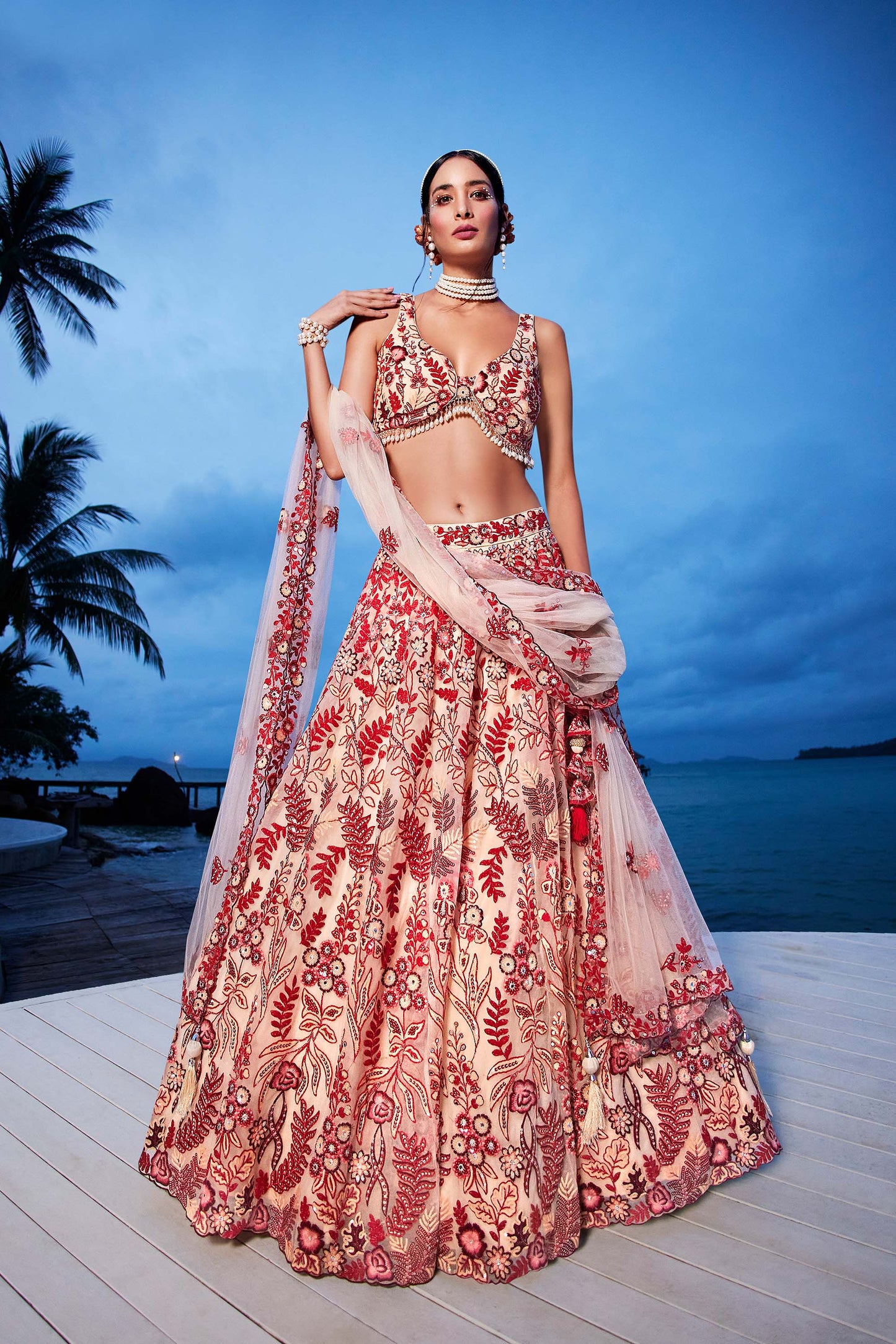 Peach Net Sequins, Mirror and thread embroidery Lehenga choli