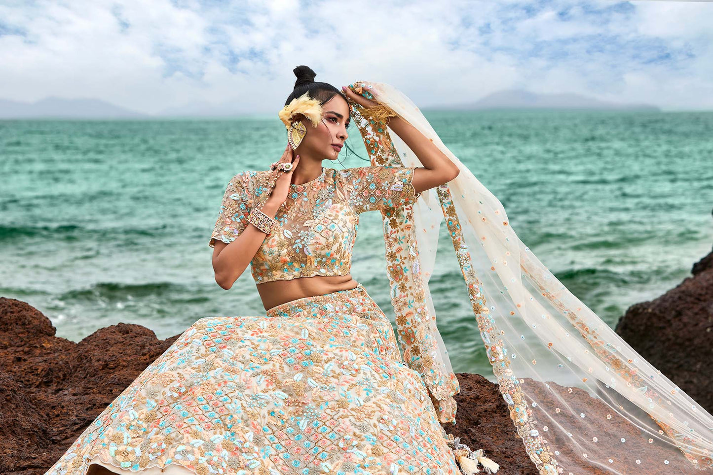 Cream Net Multi colour Sequins, Zarkans and thread embroidery Lehenga