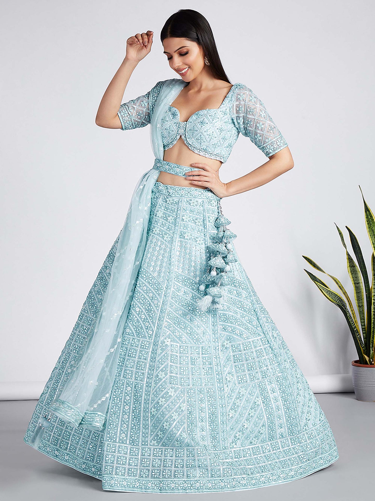 Turquoise blue Net Sequins, Zarkan and thread embroidery Lehenga