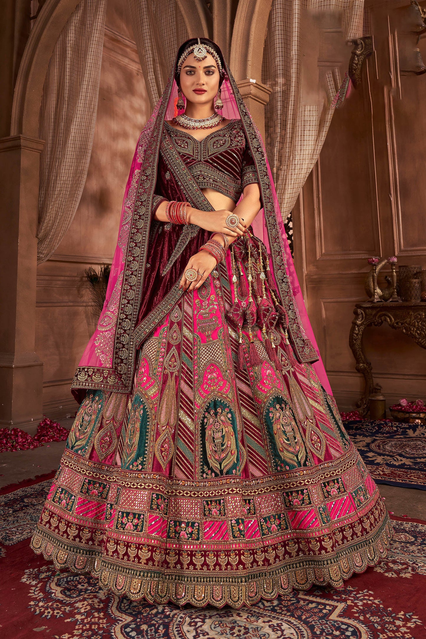 Rani Pink Velvet Hand Embroidered Heavy Bridal Lehenga