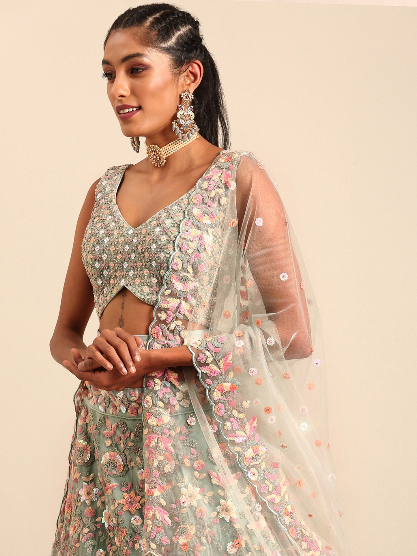 Sea green Net Multi Sequins& Zarkan embroidery Lehenga