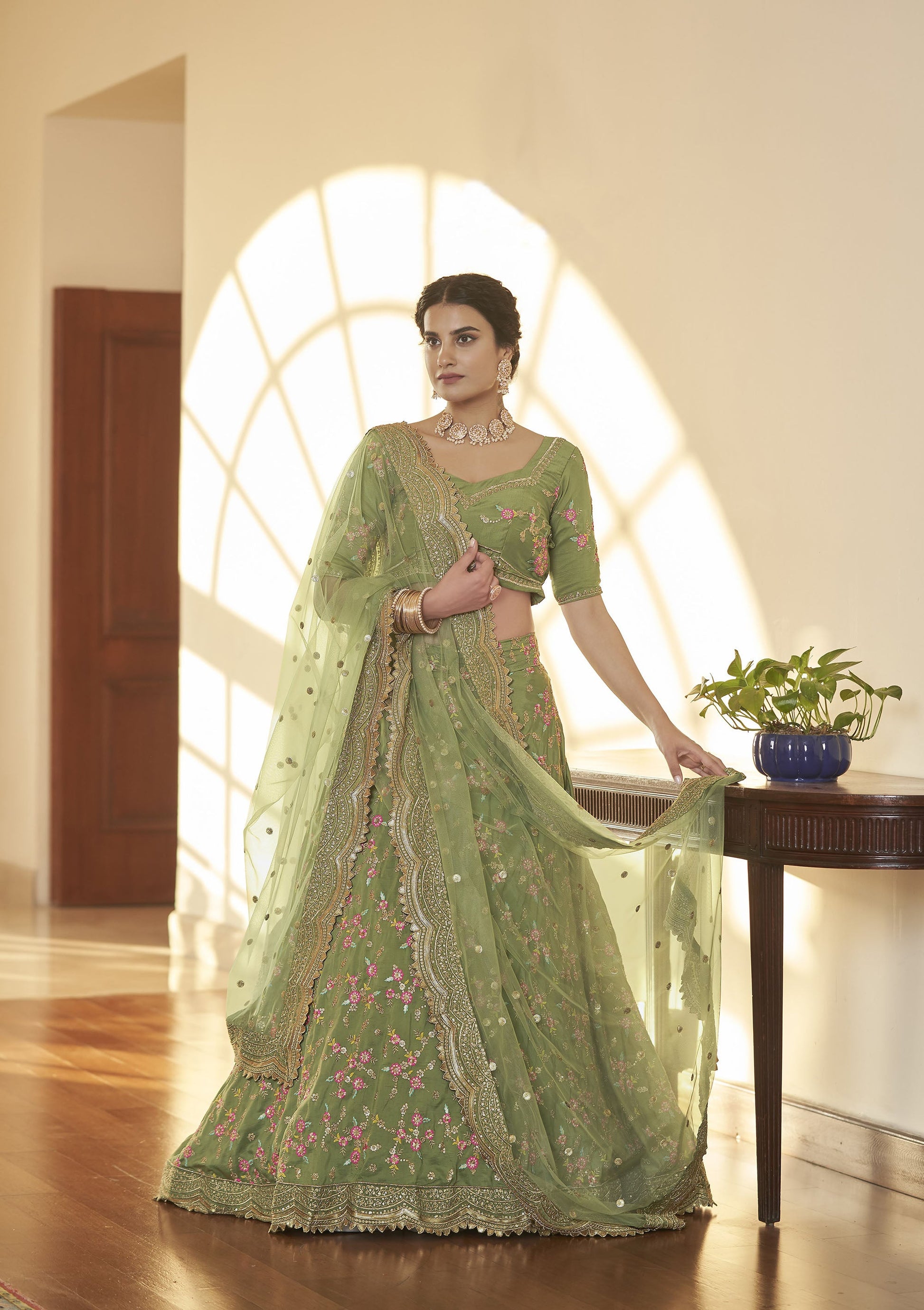 Green Chinnon Silk Sequins Work Engagement Lehenga