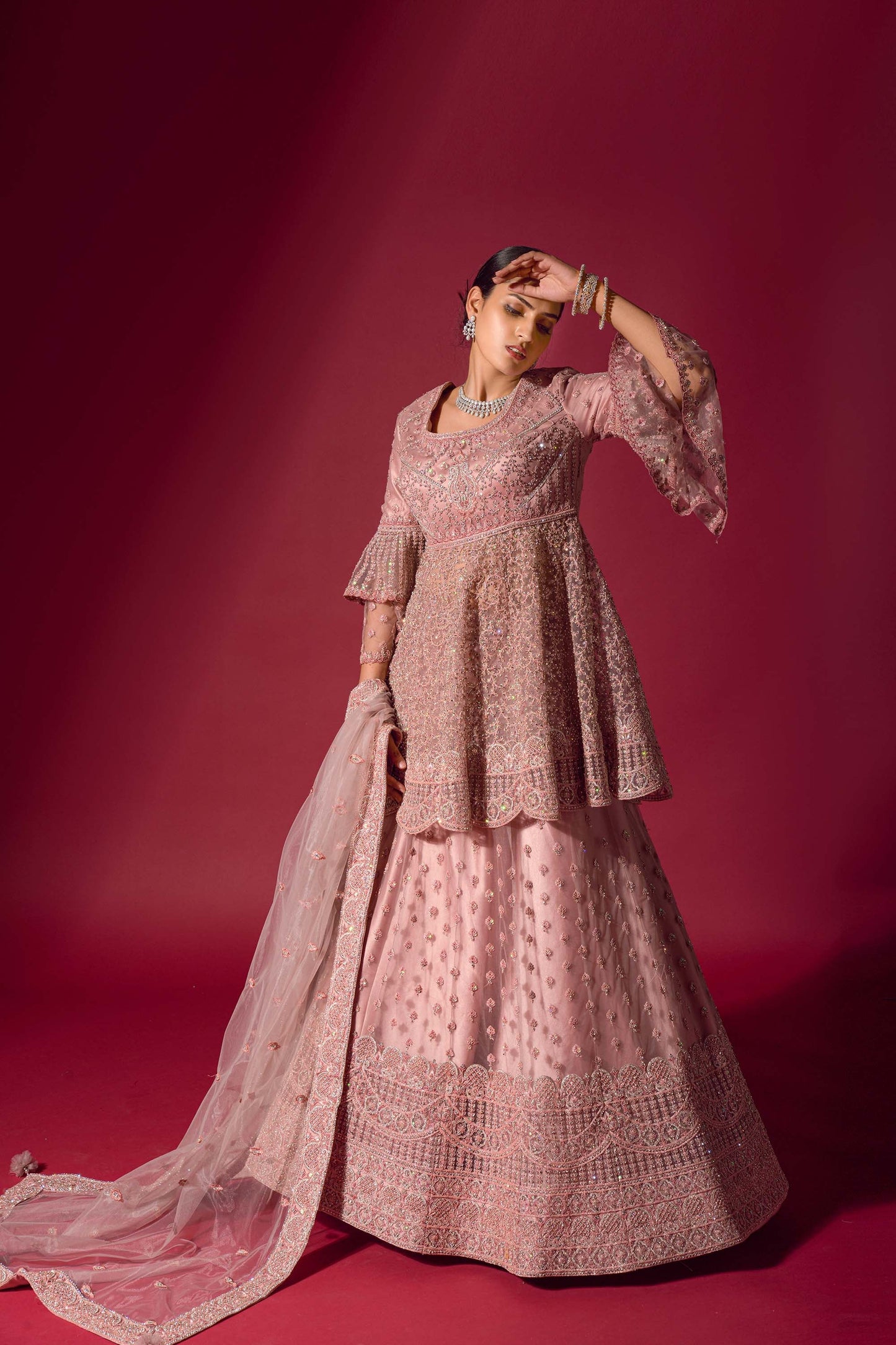 Classy Pink Embroidered Peplum Jacket Lehenga